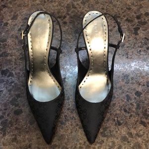 Sling back high heel shoes